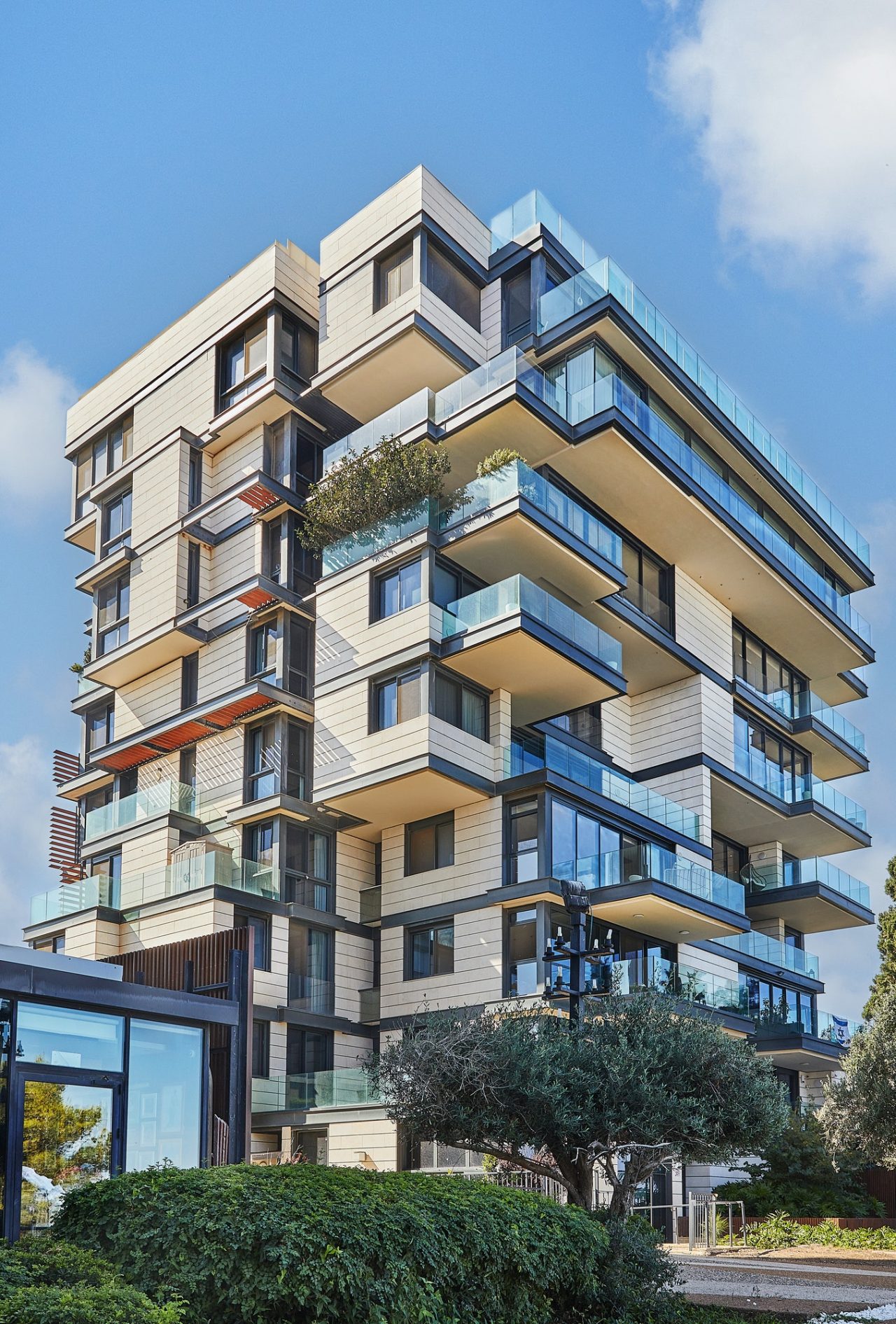 luxurious house with balconies on boulevard near the sea with green spaces
